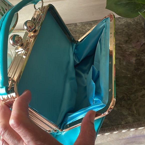 TURQUOISE WITH GOLD TRIM FITTED HANDBAG IS ALSO A CROSSBODY PURSE. - Picture 15 of 16